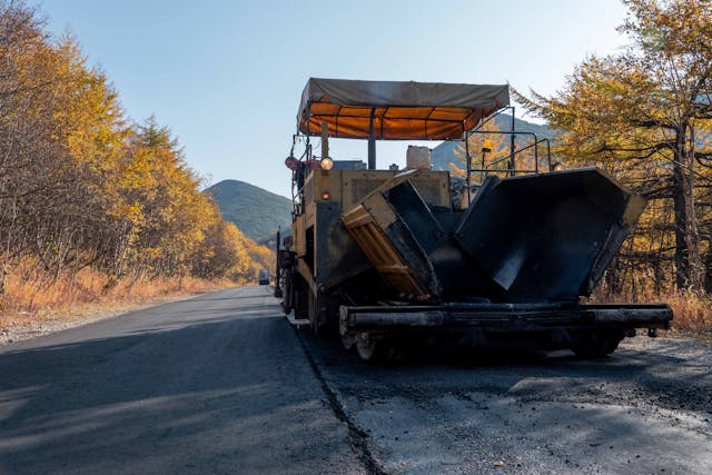 Asphalt paving equipment on a roadway